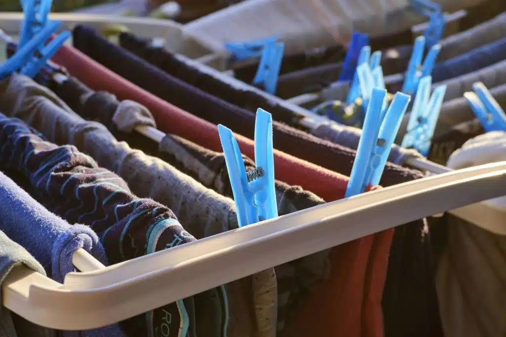 Clothes drying on rack inside a small Sydney apartment